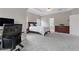 Large main bedroom with hardwood furniture, ceiling fan and ensuite bath at 290 Bluff Oak Dr, Roswell, GA 30076