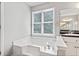 Soaking tub with jets and a large window at 308 Golden Ct, Canton, GA 30114