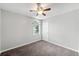 Bedroom featuring carpet, window, and ceiling fan at 308 Golden Ct, Canton, GA 30114