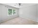 Bedroom with neutral carpet and window at 308 Golden Ct, Canton, GA 30114