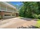 Back of house showing the garages, brickwork and covered porch at 308 Golden Ct, Canton, GA 30114