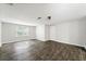 Large living room with wood-look floors and abundant natural light at 308 Golden Ct, Canton, GA 30114