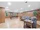 Spacious basement featuring a pool table, comfortable seating, and natural light from windows at 335 S Satinwood Pl, Roswell, GA 30076