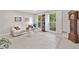 Bright living room filled with natural light with neutral decor at 335 S Satinwood Pl, Roswell, GA 30076
