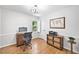 Bright office space with hardwood floors, a window view, and stylish decor at 335 S Satinwood Pl, Roswell, GA 30076