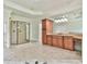 The stunning bathroom includes a glass shower, double vanities, and beautiful tile work at 5121 Hope Sw Ct, Lilburn, GA 30047