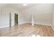 The bonus room features hardwood floors and an open concept perfect for multiple uses at 5121 Hope Sw Ct, Lilburn, GA 30047