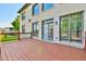 A spacious wooden deck with access to the home's interior is perfect for entertaining at 5121 Hope Sw Ct, Lilburn, GA 30047