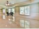 Bright living room with trim work, windows, recessed lights and marble-look floors at 5121 Hope Sw Ct, Lilburn, GA 30047