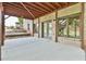 Covered patio area with brick columns and wooden ceiling at 5121 Hope Sw Ct, Lilburn, GA 30047