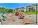 A community playground offers safe space for childen, with slides and climbing structures at 5121 Hope Sw Ct, Lilburn, GA 30047