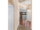 Foyer featuring hardwood floors, and decorative lighting fixtures at 5250 Villa Lake Ct, Suwanee, GA 30024