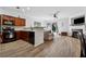 Combined kitchen and living area with hardwood floors and modern appliances at 771 Arbor Gate Ln, Lawrenceville, GA 30044