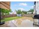 Spacious backyard featuring a concrete patio, storage shed, and privacy fence at 773 Minor Oaks Nw Run, Lilburn, GA 30047
