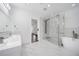 Beautiful bathroom with double vanity, glass shower and a free standing tub at 773 Minor Oaks Nw Run, Lilburn, GA 30047