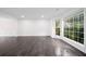 Light-filled room with beautiful hardwood floors and large windows at 773 Minor Oaks Nw Run, Lilburn, GA 30047