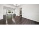 Dining room featuring hardwood floors, decorative molding, and an elegant chandelier at 773 Minor Oaks Nw Run, Lilburn, GA 30047
