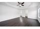 Large main bedroom with trey ceiling and en suite bathroom at 773 Minor Oaks Nw Run, Lilburn, GA 30047