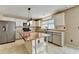 Spacious kitchen with stainless steel appliances and an island with wood countertop at 12060 Carriage Park Ln, Duluth, GA 30097
