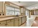 Kitchen with ample counter space, stainless steel sink, and sliding door at 12060 Carriage Park Ln, Duluth, GA 30097
