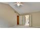 A spacious main bedroom with closet doors that open to main bathroom at 12060 Carriage Park Ln, Duluth, GA 30097