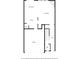Floor plan of the first floor of a house, showing kitchen, living room, dining area, and garage at 218 Ellis Ln, Woodstock, GA 30189