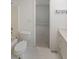 This bathroom features tile flooring, a toilet, white sink vanity and a shower/tub combination at 2394 Burch Ne Cir, Brookhaven, GA 30319