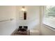 Modest bathroom with a wood vanity, round sink, and neutral colored walls for a simple yet functional space at 2394 Burch Ne Cir, Brookhaven, GA 30319