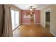 Cozy dining area with hardwood floors leads to a sliding door and connects seamlessly with the adjacent kitchen space at 2394 Burch Ne Cir, Brookhaven, GA 30319