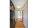 Inviting entry featuring gleaming hardwood floors, neutral walls, and a stylish front door at 2394 Burch Ne Cir, Brookhaven, GA 30319