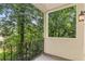 Private balcony overlooking lush greenery, offering a serene outdoor space at 408 Coleraine Se, Smyrna, GA 30080