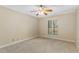 Bedroom featuring a ceiling fan, neutral carpet, crown molding, and a bright window at 408 Coleraine Se, Smyrna, GA 30080