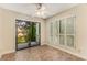 Bright dining room with sliding door to balcony and contemporary ceiling fan at 408 Coleraine Se, Smyrna, GA 30080