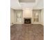 Spacious living room featuring a cozy fireplace and abundant natural light at 408 Coleraine Se, Smyrna, GA 30080