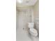 A brightly lit full shower area, with easy to access toilet and safety bar at 408 Coleraine Se, Smyrna, GA 30080