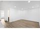 Finished basement featuring neutral paint and new flooring at 2528 Morgan Chase Dr, Buford, GA 30519