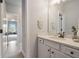 Hallway bathroom with a white vanity at 3352 Stone Point Way, Buford, GA 30519