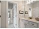 Bright bathroom showcasing a modern vanity with white cabinets and a tile floor at 3352 Stone Point Way, Buford, GA 30519