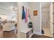 Organized mud room includes seating, storage, coat hooks, and direct access to bathroom and living areas at 3352 Stone Point Way, Buford, GA 30519
