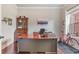 Home office with hardwood floors, vintage furnishings, and a large desk perfect for remote work at 3352 Stone Point Way, Buford, GA 30519