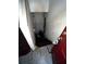 A stairway leading to the basement with a door in the basement at 5568 Bradley Cir, Lithonia, GA 30038