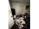 Bedroom in need of cleaning and repair at 5568 Bradley Cir, Lithonia, GA 30038