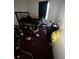 Interior view of bedroom highlighting a bed and cluttered personal items at 5568 Bradley Cir, Lithonia, GA 30038