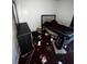 Interior view of bedroom highlighting a bed, dresser and cluttered personal items at 5568 Bradley Cir, Lithonia, GA 30038