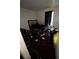 Interior view of bedroom highlighting a bed and cluttered personal items at 5568 Bradley Cir, Lithonia, GA 30038