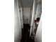 Hallway with doors and flooring needing repair or replacement at 5568 Bradley Cir, Lithonia, GA 30038