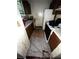 Unmaintained kitchen area, damaged floor, and aging stove require extensive restoration to improve functionality at 5568 Bradley Cir, Lithonia, GA 30038