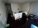 Room in need of repair with dirty carpet and peeling paint at 5568 Bradley Cir, Lithonia, GA 30038