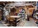 Unfinished basement features a workbench and storage space at 8295 St Marlo Fairway Dr, Duluth, GA 30097
