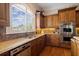 Beautiful kitchen with stainless appliances, granite counters, and custom wood cabinets at 8295 St Marlo Fairway Dr, Duluth, GA 30097